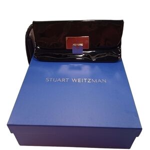 STUART Weitzman patent leather wristlet clutch